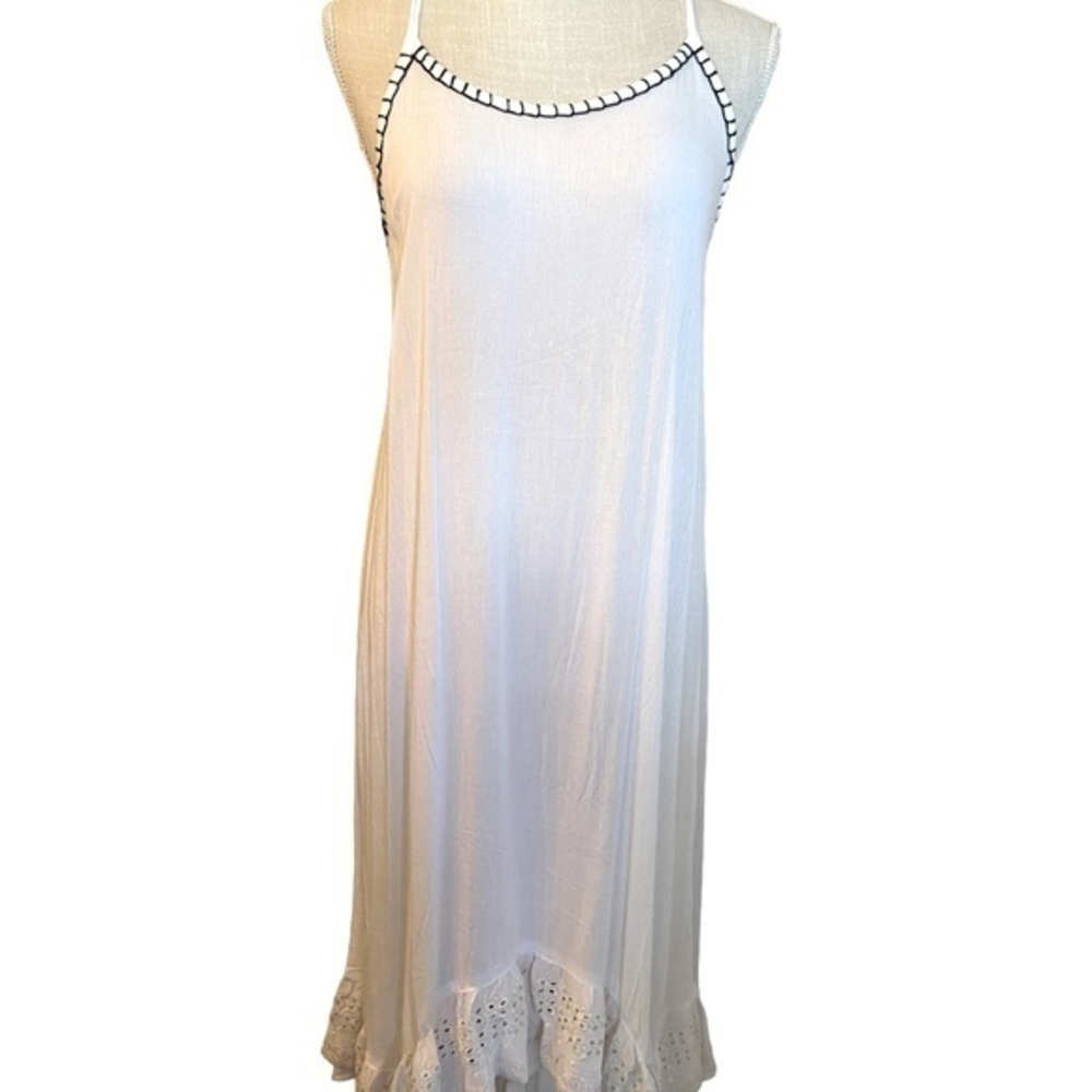 Paradise white with navy blue trim on neck and embroidered white bottom trim